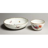 A CONTINENTAL PORCELAIN CIRCULAR DISH 8ins and a bowl 4.5ins diameter painted with flowers.