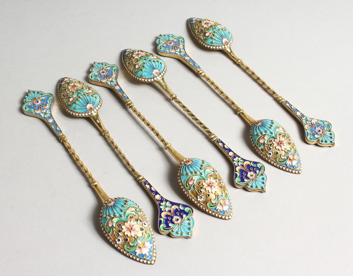 A SET OF SIX RUSSIAN SILVER AND ENAMEL SPOONS Stamped '84' 7ozs.