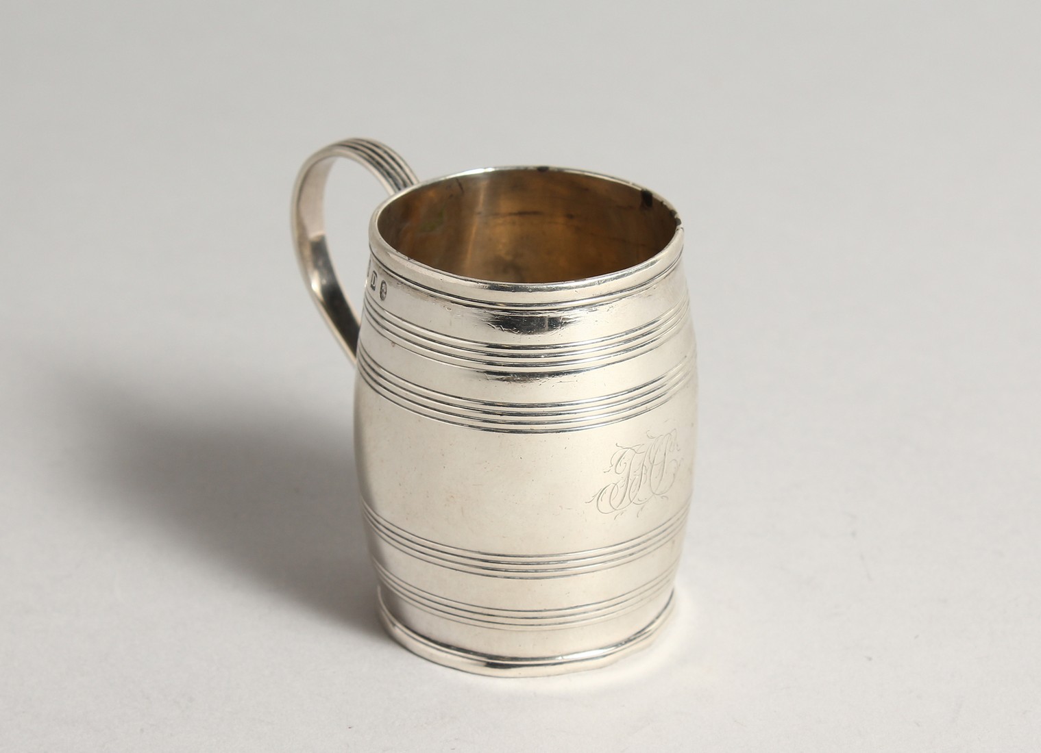 A GEORGE III SILVER BARREL SHAPED MUG London 1782