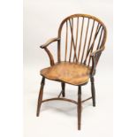 A GOOD YEW WOOD AND ELM WINDSOR ARM CHAIR