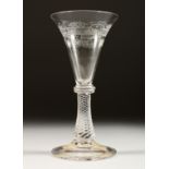 A LATE 19TH /EARLY 2OTH CENTURY ALE GLASS, with etched conical shaped bowl, air twist stem on a