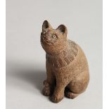 A JAPANESE CARVED WOODEN SEATED CAT Signed