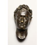 A SMALL GRAND TOUR BRONZE ROMAN HEAD 3.75ins high.