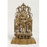 A CHINESE GILT BRONZE FIGURAL SHRINE 11ins high