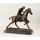 A CONTEMPORARY BRONZE MODEL OF A POLO PLAYER IN ACTION, mounted on a rectangular marble base, with