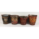 FOUR EARLY 18TH CENTURY LEATHER FIRE BUCKETS with various coat of arms.