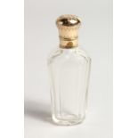 A TAPERING GLASS TOP SCENT BOTTLE 3.5ins long.