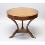 A FRENCH DESIGN ROSEWOOD AND BRASS INLAID CIRCULAR TABLE, the top with a single drawer on three