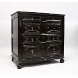 A GOOD LATE 17TH CENTURY, DARK OAK, TWO PIECE LINEN FOLD FRONT, CHEST OF FOUR DRAWERS with brass