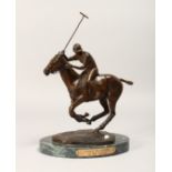 D. R. RUSHING "POLO PLAYER" , a small bronze sculpture of a polo player on horseback ready to strike