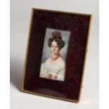 A MINIATURE OF A YOUNG LADY 4ins x 2ins in a folding frame