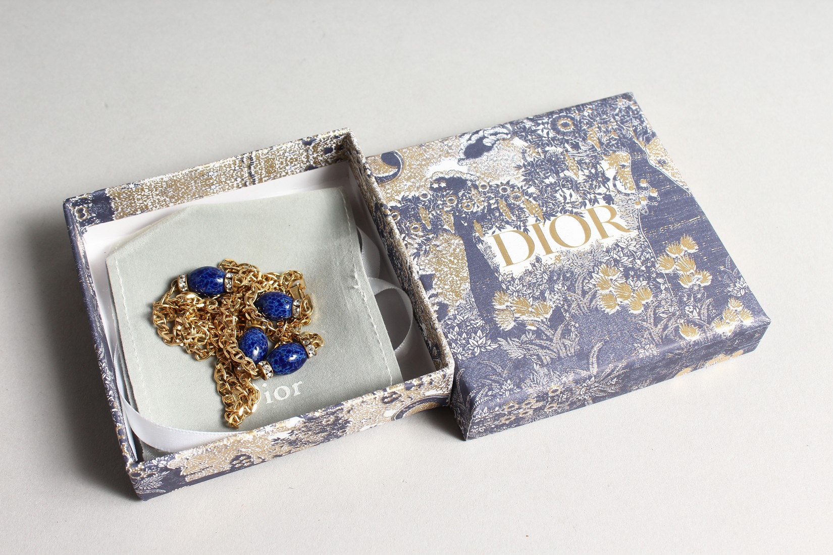 A CHRISTIAN DIOR 1980'S GILT AND LAPIS NECKLACE in a Christian Dior box. - Image 4 of 4