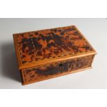 A TORTOISESHELL RECTANGULAR BOX AND COVER 8.5ins long.