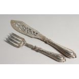 A GOOD PAIR OF PIERCED AND ENGRAVED VICTORIAN FISH SERVERS. London 1850, maker J.G.