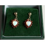 A PAIR OF 9CT GOLD OPAL AND GARNET HEART SHAPED EARRINGS