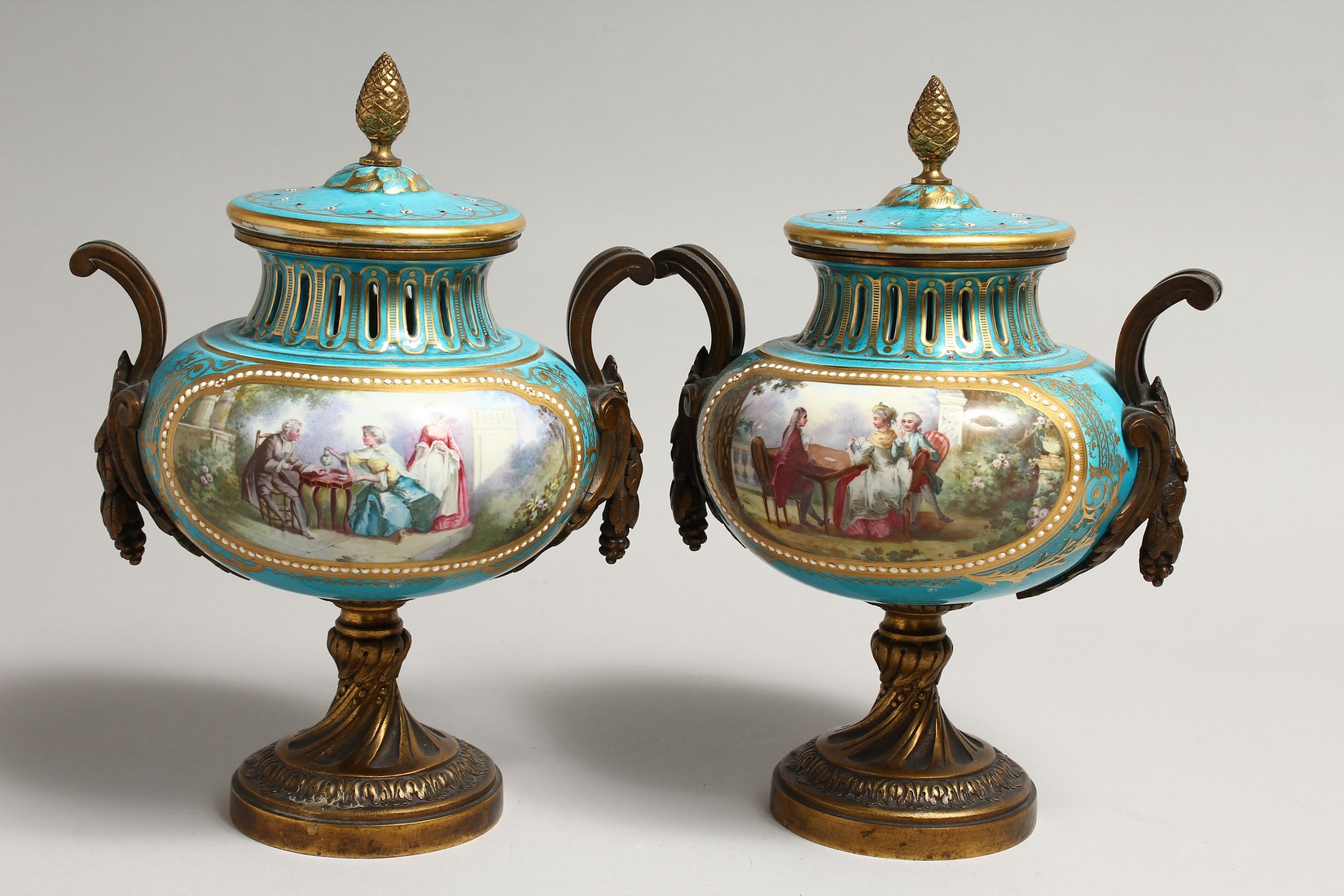 A SUPERB PAIR OF SEVRES PORCELAIN ORMOLU MOUNTED CIRCULAR VASES AND COVERS, painted with reverse - Image 3 of 6