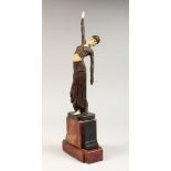 AN ART DECO STYLE FIGURE OF A LADY, arm outstretched, on a stepped marble base 16ins high.