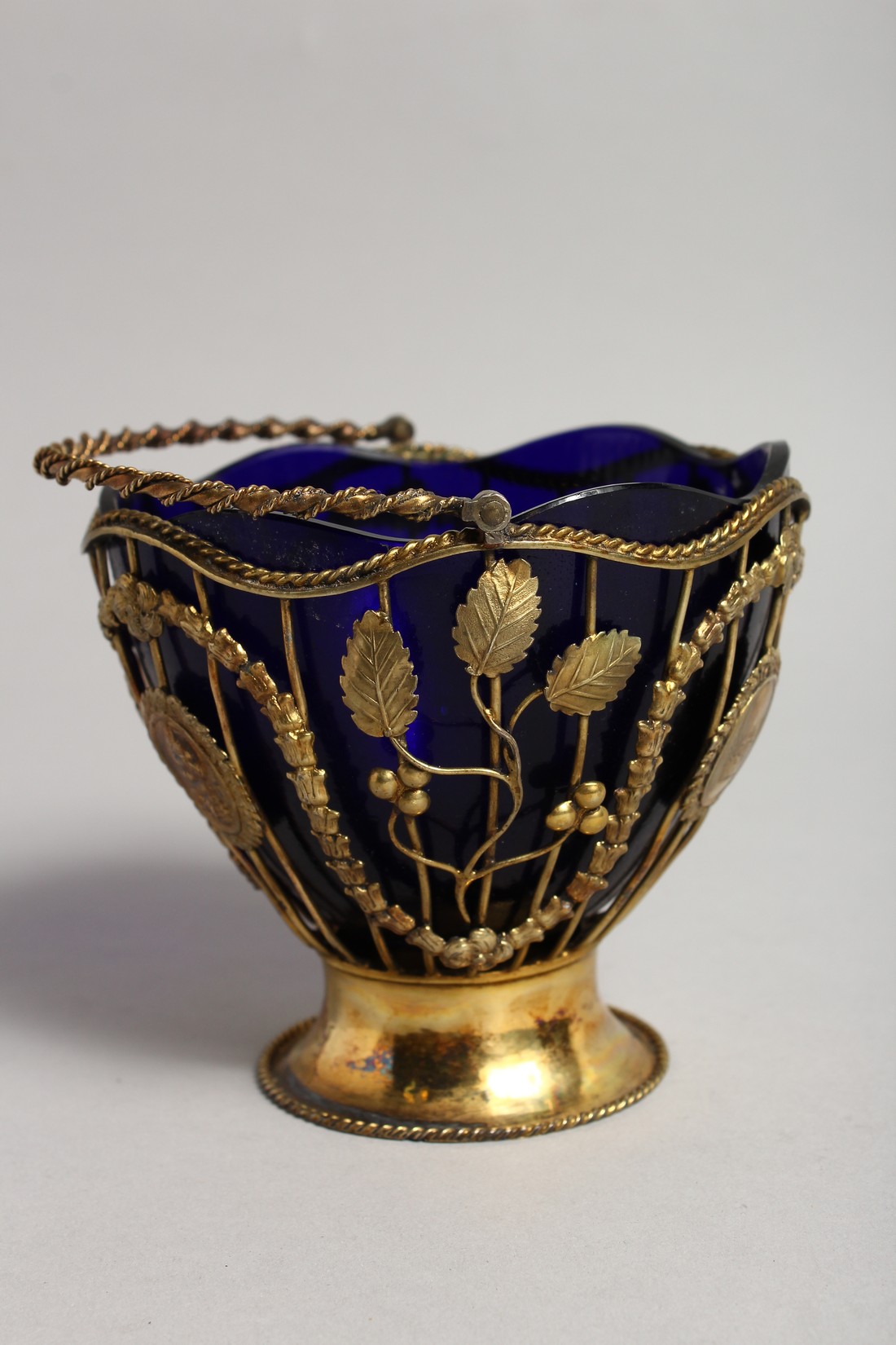 A GOOD GEORGE III SILVER GILT SUGAR BASKET with garlands and medallions and twist handle. London - Image 3 of 8