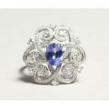 A GOOD 18CT WHITE GOLD, DIAMOND AND SAPPHIRE RING