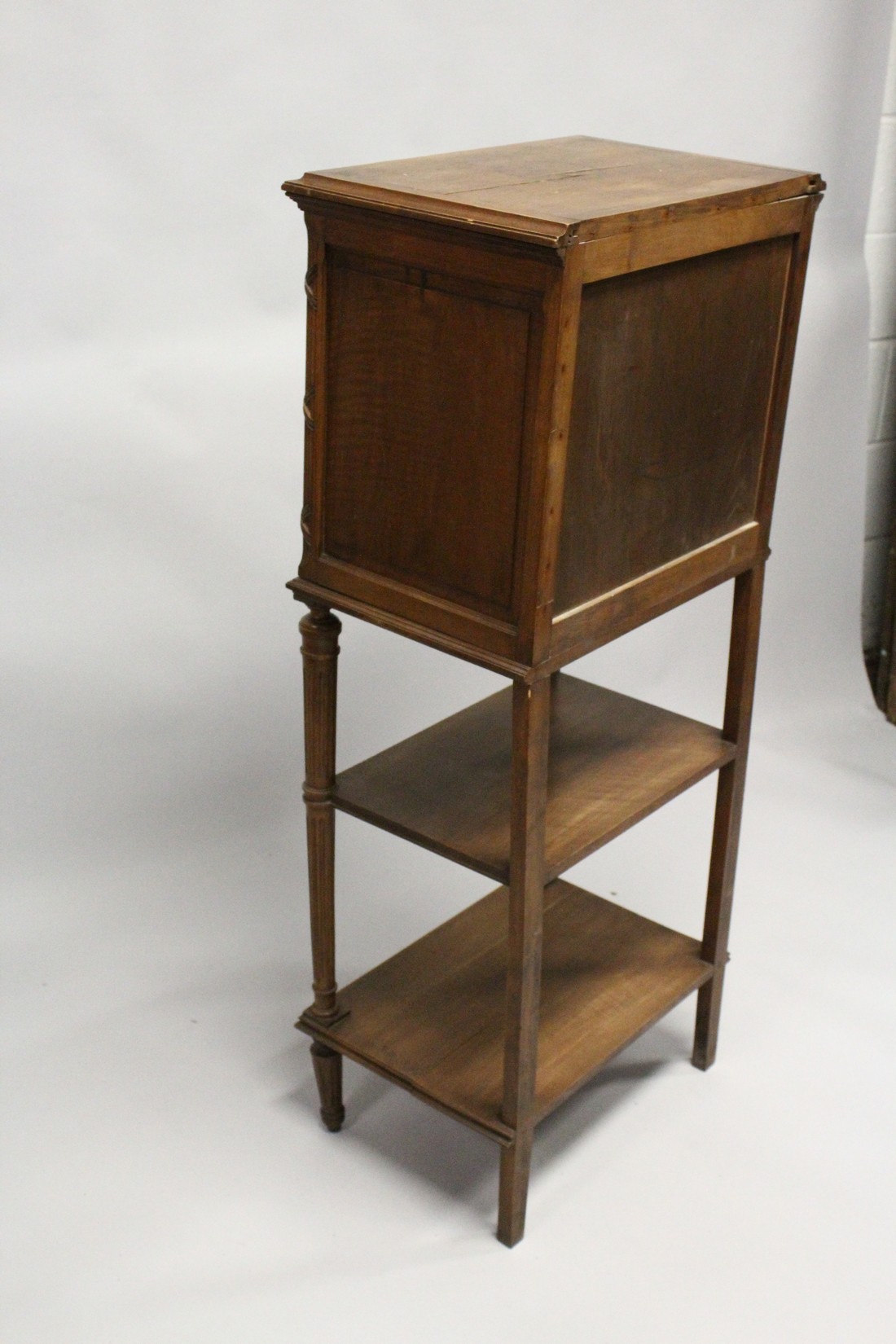 A LATE 19TH CENTURY FRENCH WALNUT MUSIC CABINET, with a pair of carved panelled doors enclosing - Image 7 of 7