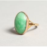 A GOLD AND JADE RING