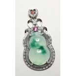 A SILVER AND JADE DOUBLE GOURD PENDANT