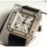 A SUPERB CARTIER DIAMOND SET AUTOMATIC WATCH and leather strap. No. 311173 C E. 2740. In original