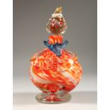 A MURANO MOTTLED ORANGE CLOWN BOTTLE AND STOPPER. 8ins high.