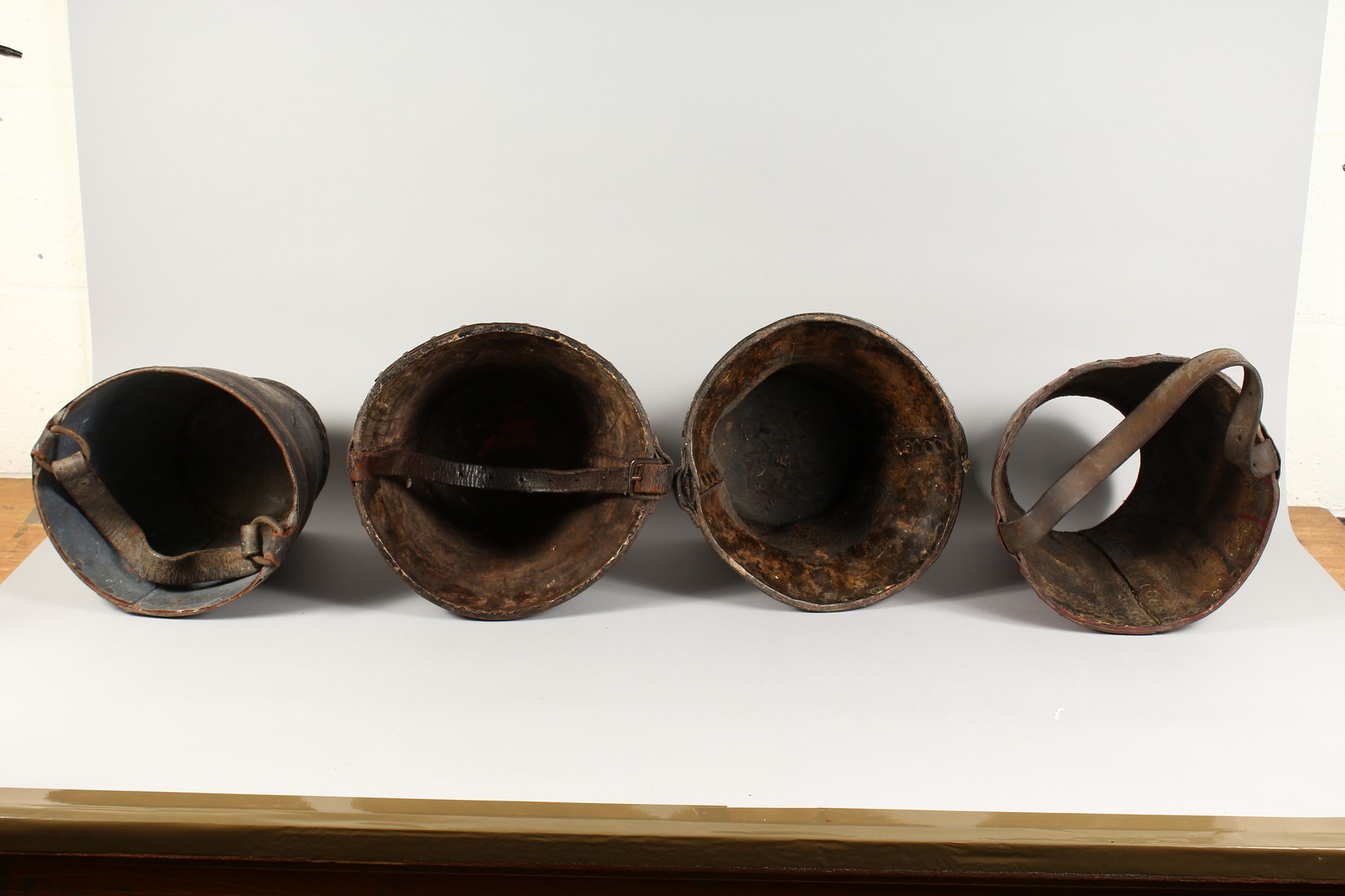 FOUR EARLY 18TH CENTURY LEATHER FIRE BUCKETS with various coat of arms. - Image 3 of 3