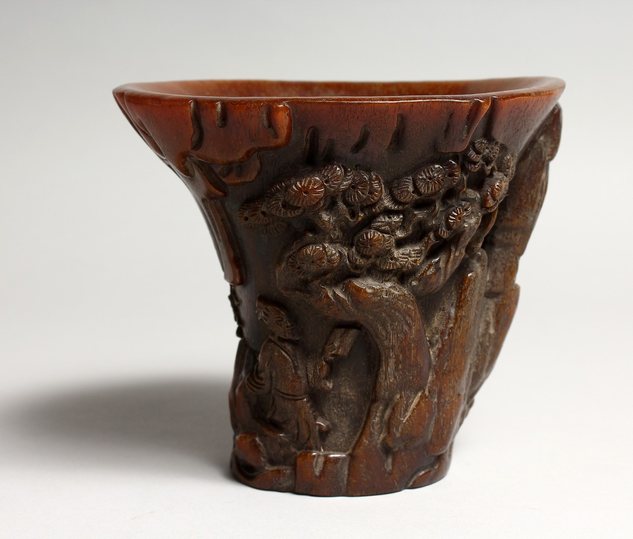 A CARVED HORN LIBATION CUP 4.5ins