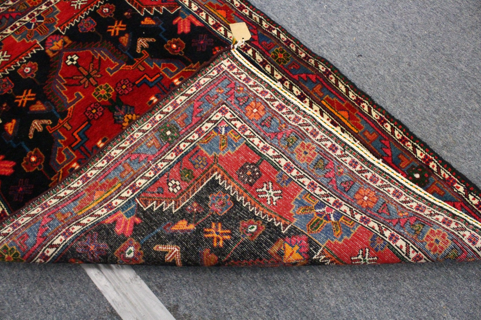 A GOOD PERSIAN RUG, 20TH CENTURY, red ground with stylised decoration. 5ft 4ins x 3ft 6ins - Image 3 of 4