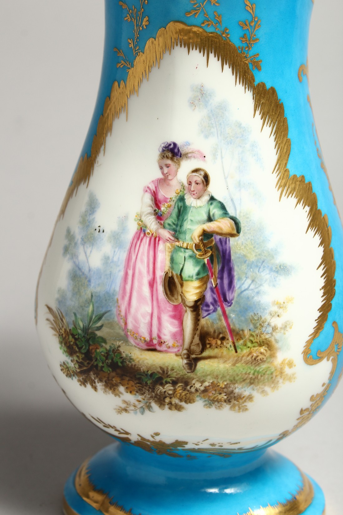 A GOOD SEVRES PORCELAIN EWER, blue ground edged in gilt and painted with three panels of figures and - Image 2 of 7