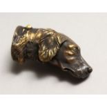 A BRASS SPORTING DOG'S HEAD VESTA 2ins long.