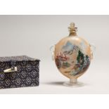 A CHINESE TWO HANDLED PEDESTAL SCENT BOTTLE, landscape scene 4ins high