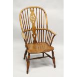 A 19TH CENTURY YEW, BEECH AND ELM WINDSOR ARMCHAIR