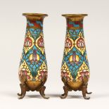 A SMALL PAIR OF GILT BRONZE AND CHAMPLEUVE ENAMEL VASES, on four scroll feet, Signed F. BARBEDIENNE.