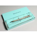 A TIFFANY SILVER PEN in a Tiffany box.