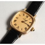 A LADIES VERY GOOD GOLD OMEGA WRIST WATCH with leather strap.