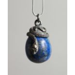 A SMALL SILVERED LAPIS PENDANT with a snake
