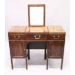 A GENTLEMAN'S GILLOWS OF LANCASTER MAHOGANY DRESSING TABLE, with rising mirror, flaps to the sides