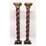 A VERY GOOD PAIR OF 18TH CENTURY CARVED SPIRAL MAHOGANY COLUMNS with carved gilded Corinthian column