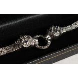 A SILVER, SAPPHIRE AND MARCASITE PANTHER BRACELET