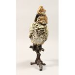 A COLD CAST BRONZE COCKATOO on a branch 12ins high