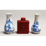 A SMALL PAIR OF CHINESE BLUE AND WHITE VASES 3ins high and a cinnabar snuff bottle.