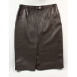 A HERMES LEATHER SKIRT, never worn.