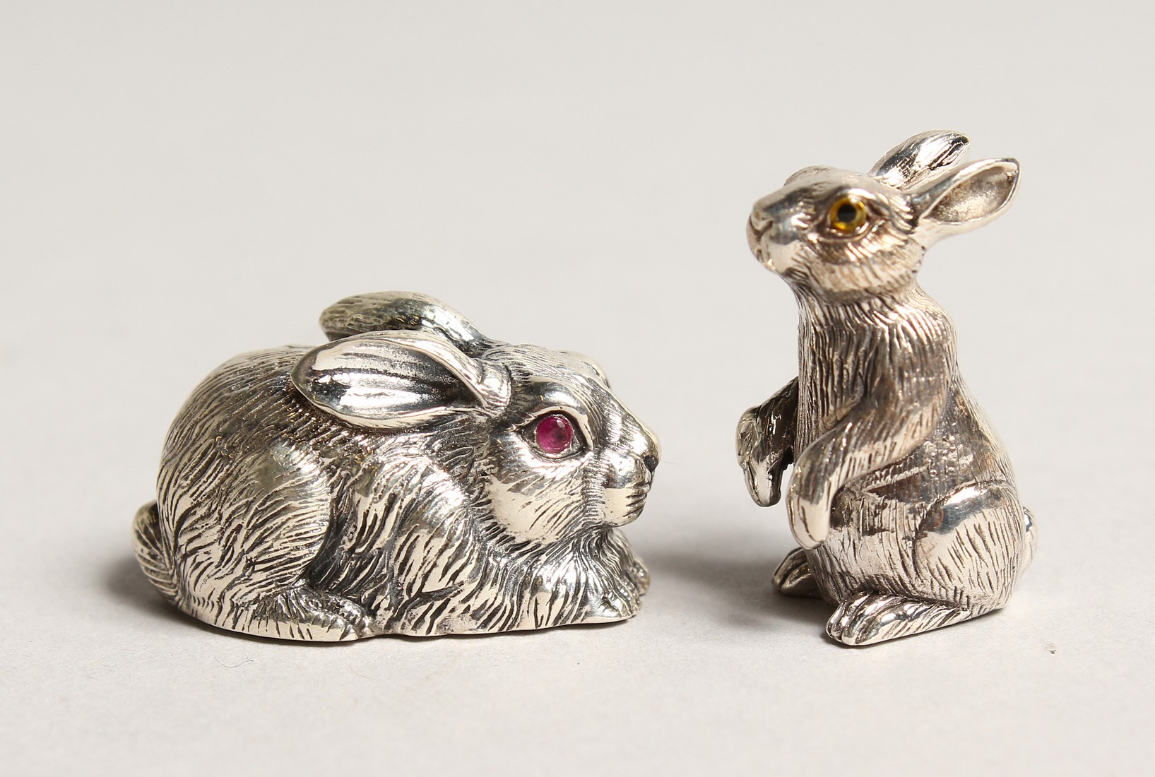 TWO NOVELTY SILVER RABBITS