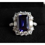 A SILVER FAUX TANZANITE DRESS RING