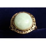 A GOLD AND JADE RING