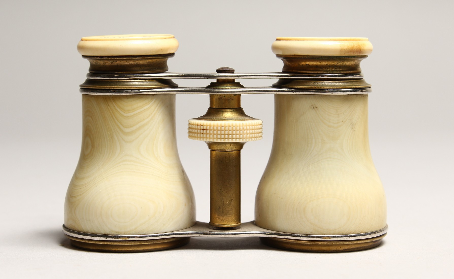 A PAIR OF IVORY OPERA GLASSES `CORNELIUS KNUDSEN, KJORENHAVEN' 4.25ins long