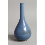 A SMALL CHINESE BLUE GROUND VASE with tall neck 5.5ins high.